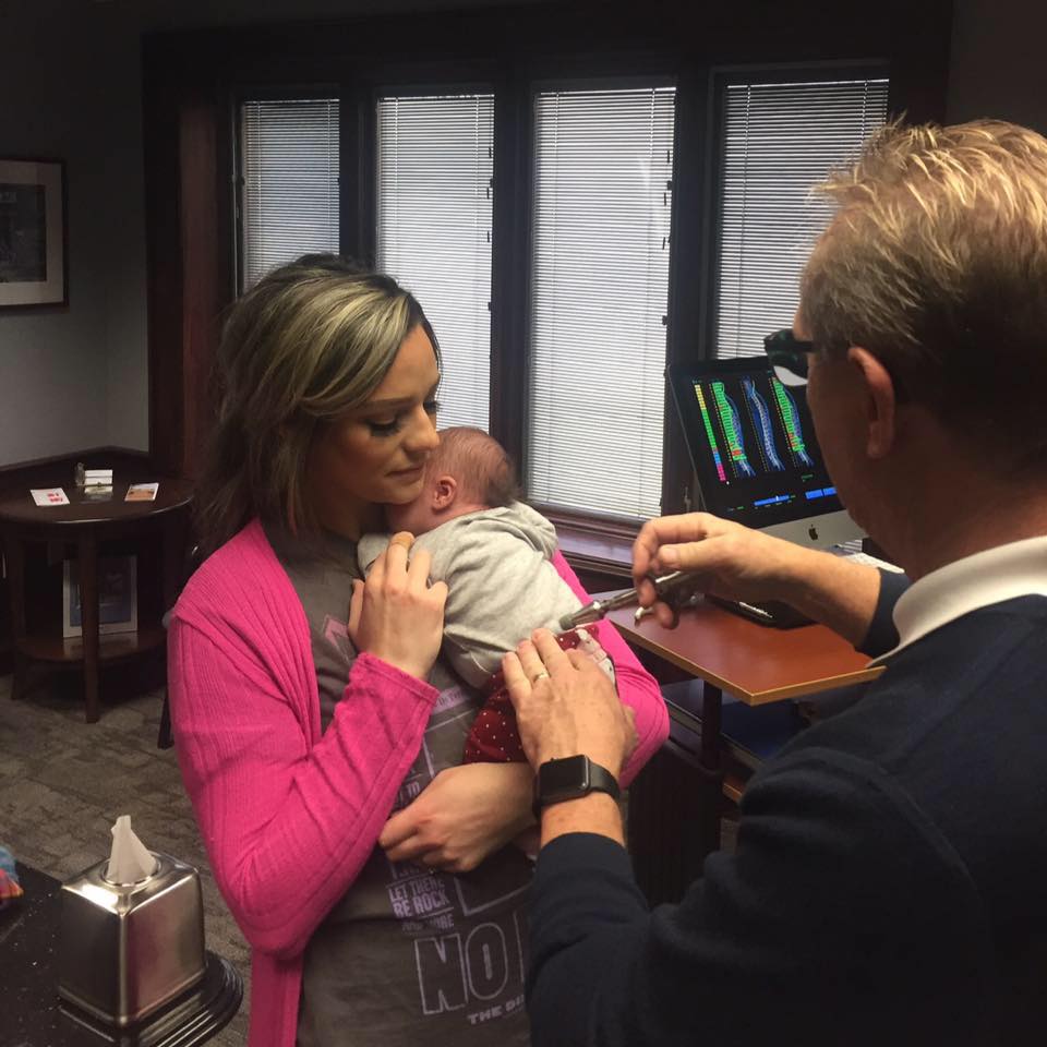 Dr Hurst adjusting newborn